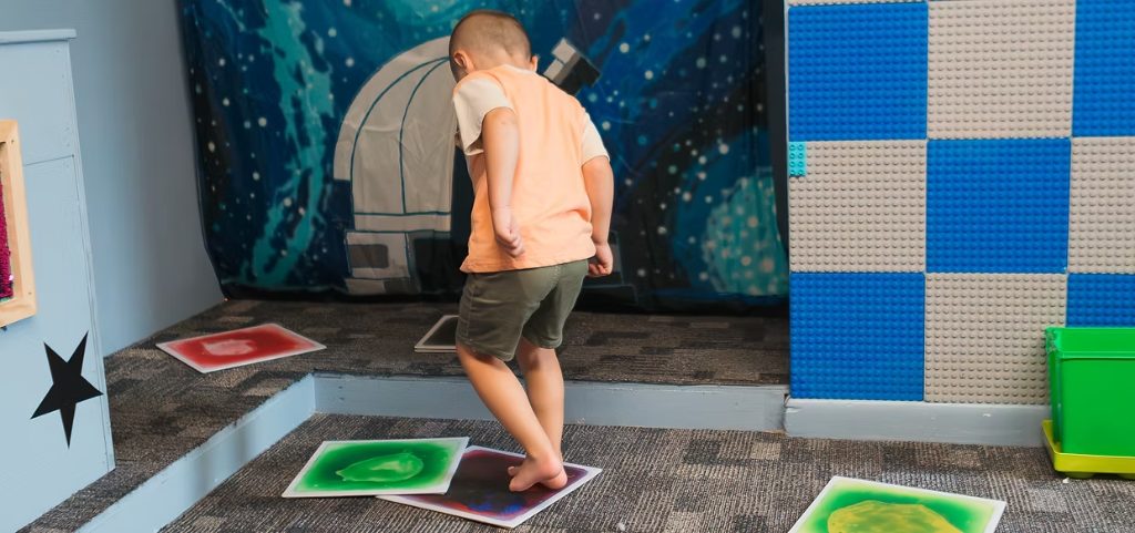 Children playing in soft indoor play area