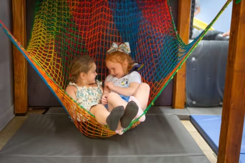 Children playing in soft indoor play area